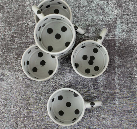 Kaffeebecher „Blot“ / Afroart